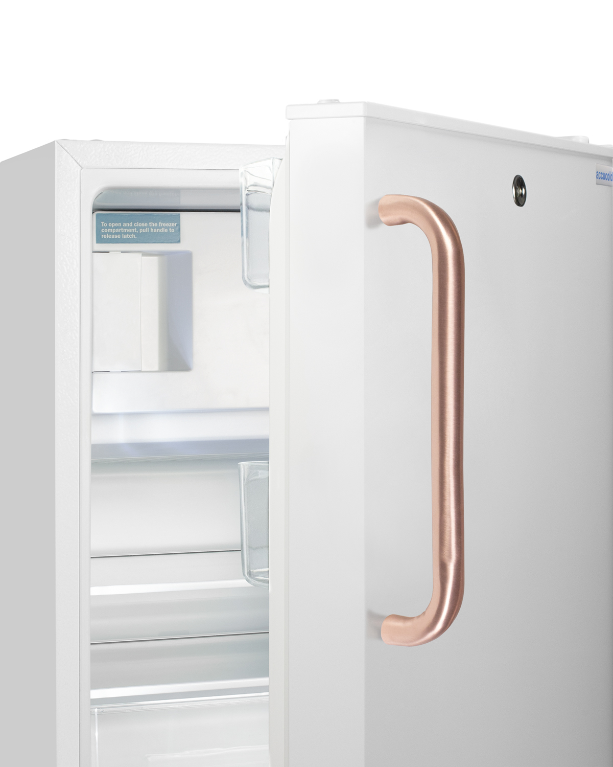 Built-in undercounter, ADA compliant refrigerator-freezer in white, designed for general purpose storage, with pure copper towel bar handle, manual defrost with glass shelves, front lock, and door storage